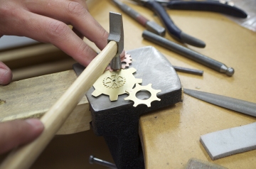 To form a steampunk style brooch